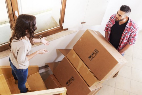 Professional movers loading boxes for a Sudbury relocation